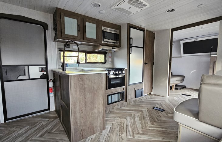 Our family of six has no problem cooking meals in here