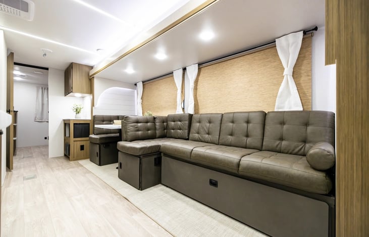 Spacious convertable Jackknife couch converts to full sized bed. Plenty of additional storage under couches. Full sized windows to enjoy the view. Pull down shades for privacy. JBL speakers througout.