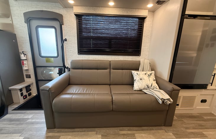 A comfortable jack knife sofa that folds down as a double bed.