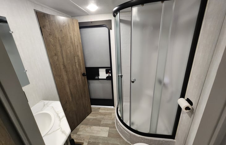 Bathroom with glass surround.