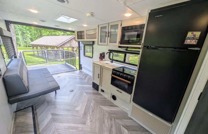 Spacious galley with large windows allow for an abundance of natural light and plenty of room for your gear or toys.