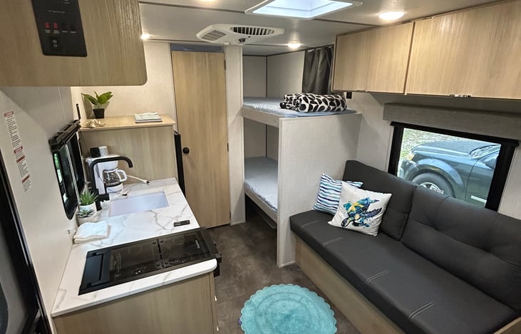 Small couch big enough for 3 and 1 sleep!