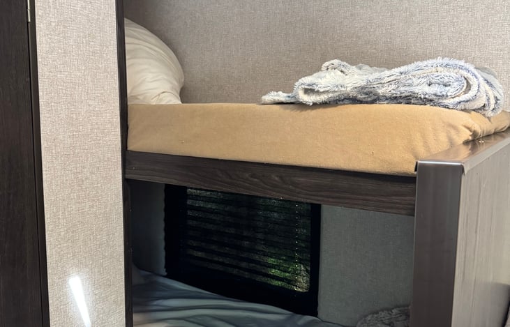 Bunks have blankets, pillows and bedding. Pro tip: bring your own blankets, it feels more like home!