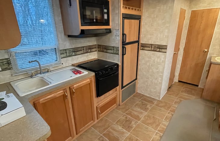 Kitchen and rear doors to bathroom and bunks