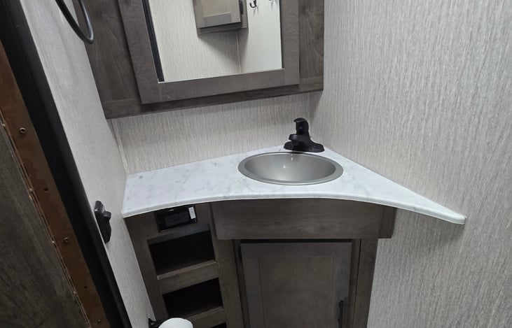 Full Bathroom Sink and plenty of Cabinets