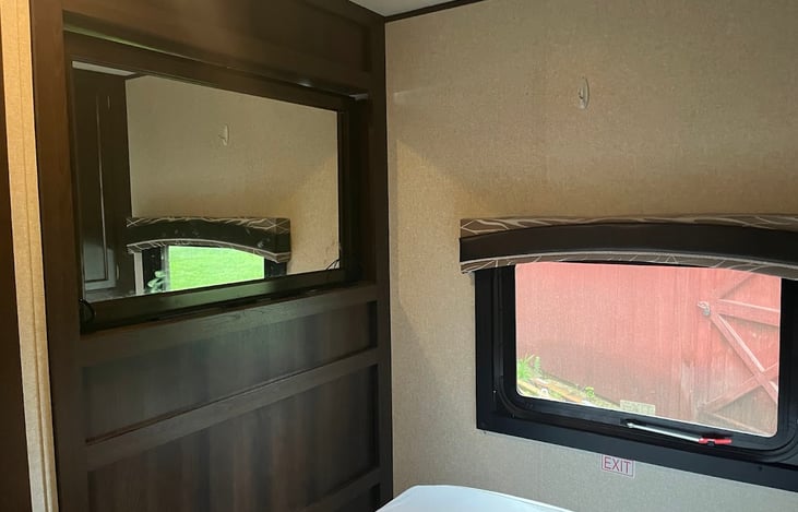 TV can swivel to be show in Queen Size Bedroom Area