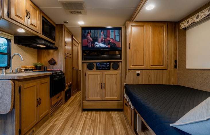 The entertainment center had an optional slide out and the TV swivels to face either the bedroom or living area