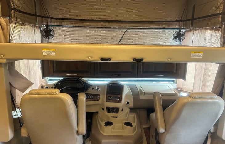 Full size bunk over drivers cabin.