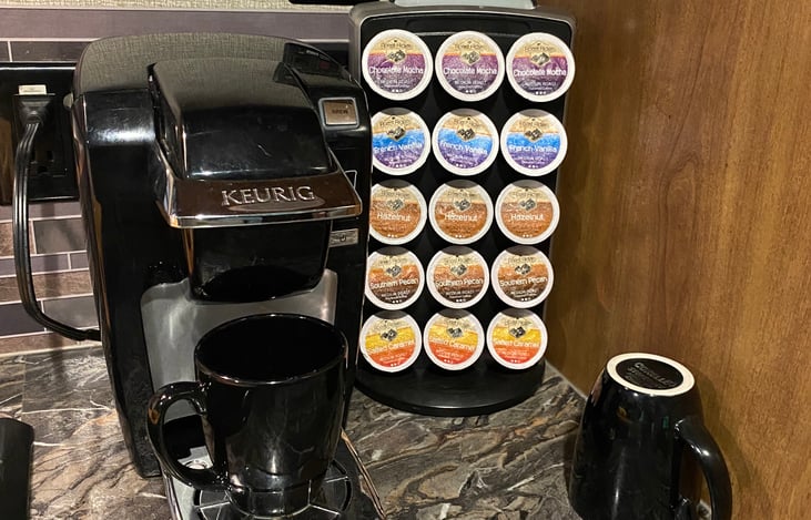 Keurig with complimentary coffee, 4 cups included. (Best to bring bottled water)