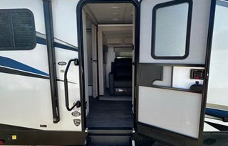 Easy access coming in and going out with this three step retractable steps that folds in and out of the interior of the trailer.