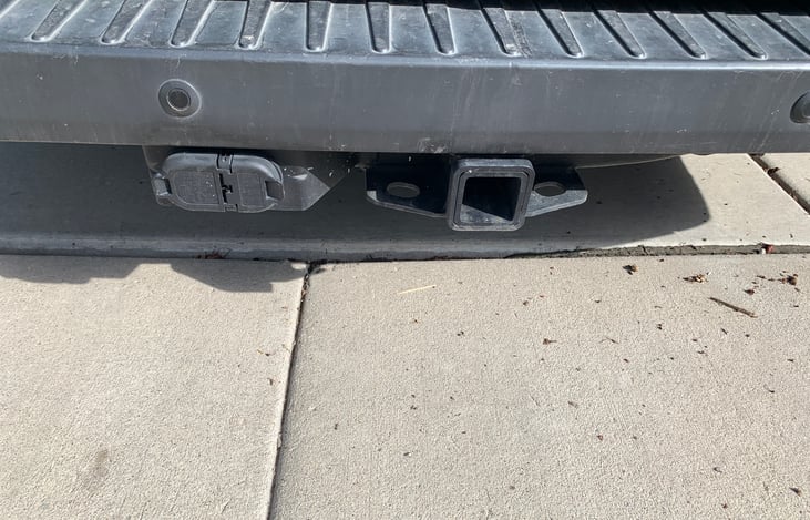 Trailer hitch.  Available items. Bike rack. Small 1 person pontoon float boat. Xtra storage rack for large items.