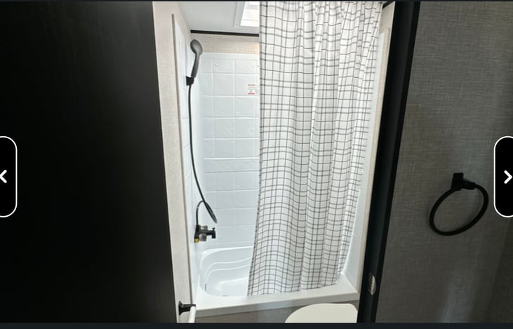 Shower with tankless water heater