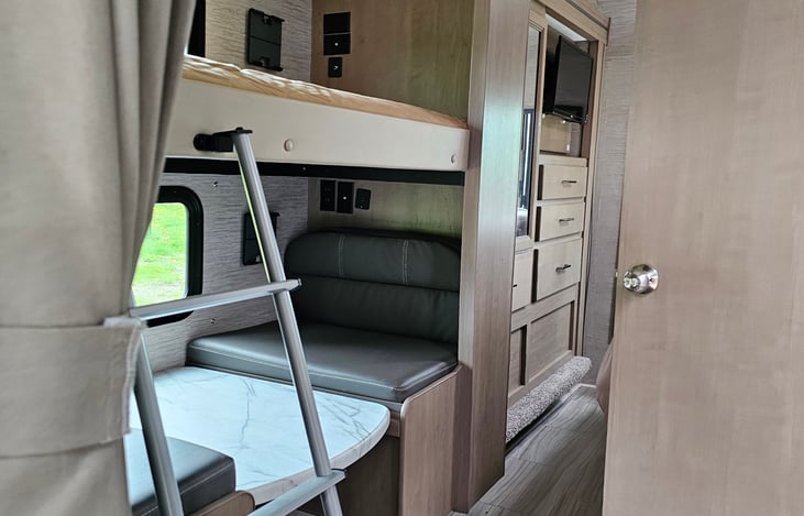 bunk room with table