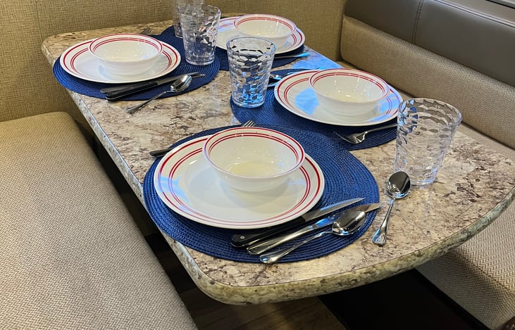 Table with included dinnerware (enough for 6 people)