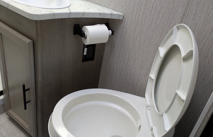 Bathroom And the Whole RV is disinfected between every use. GFCI test/reset is located in the bathroom under the toilet paper... if you happen to trip the circuit.