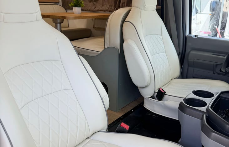 Spacious RV cockpit with comfortable seating for an enjoyable driving experience