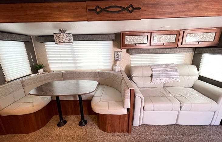 Dinette converts to a Twin plus bed & couch pulls out to a full-size bed.