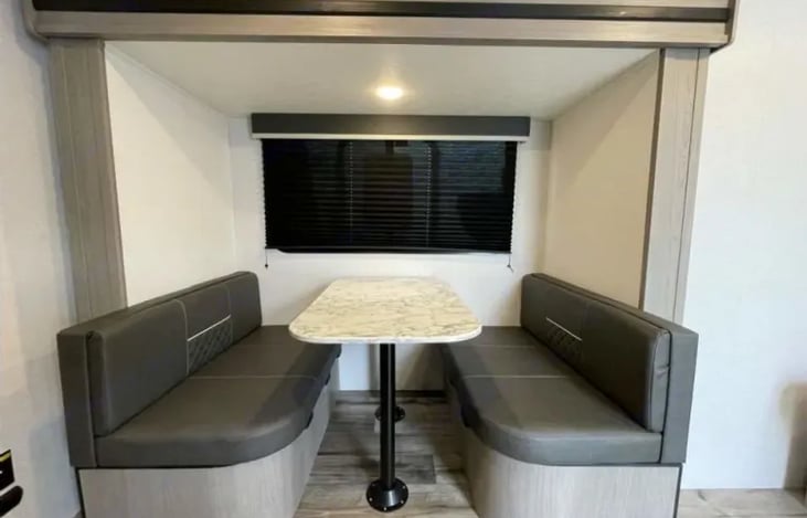 Dining Area/Additional bed, Under bench storage both sides.