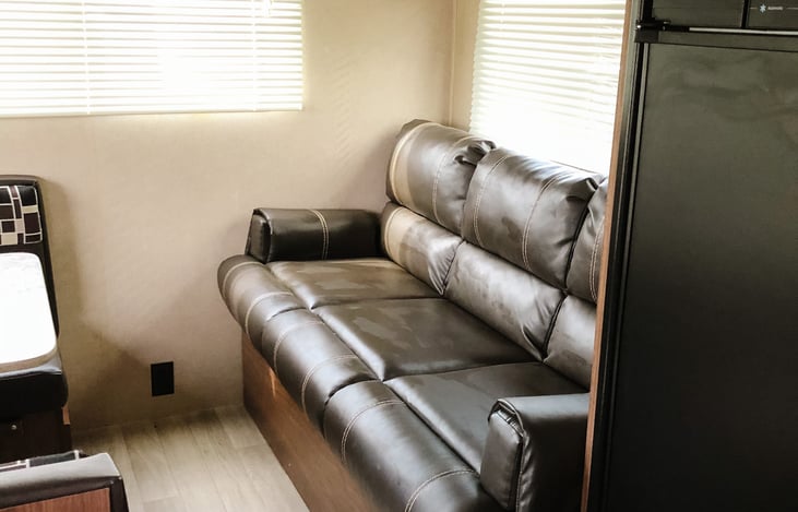 Jack knife sofa has storage underneath