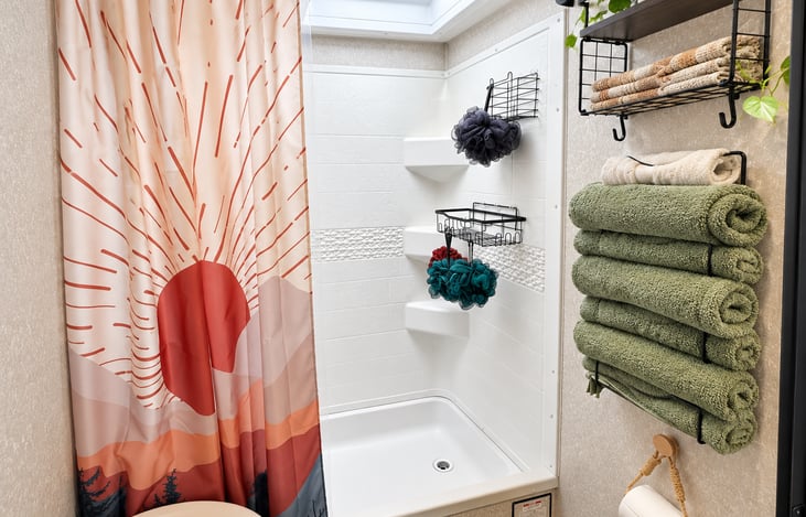 Shower with storage. We will be providing shampoo, conditioner, and body wash. There won't be loofahs, but there will be wash rags available.