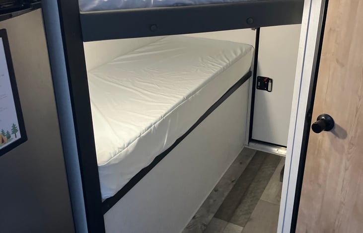 Bottom bunk is now a half bunk.