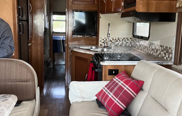 Full size kitchen, refrigerator, microwave, dinette, sofa bed.