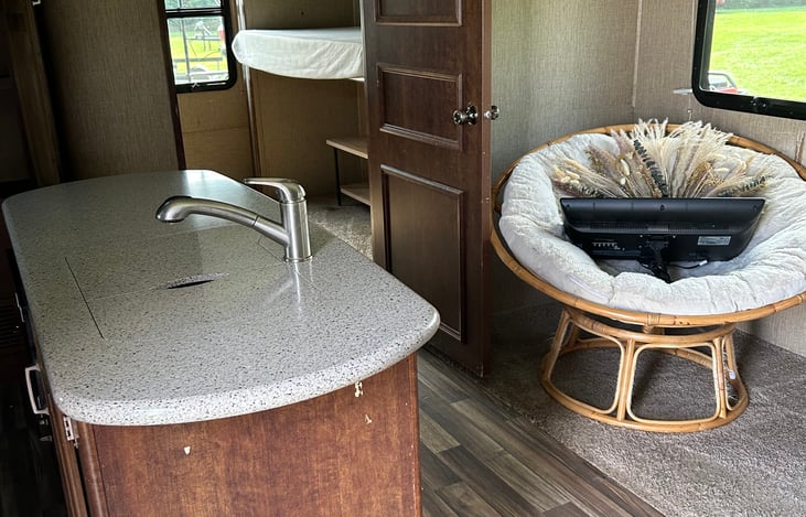 Island with under counter microwave.