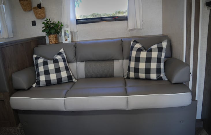 luxurious sofa expands into a full sized bed for additional sleeping space.