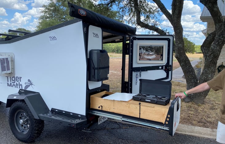5 gallon water tank for washing dishes and hands.