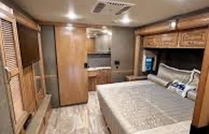 Large king size bed in rear bedroom