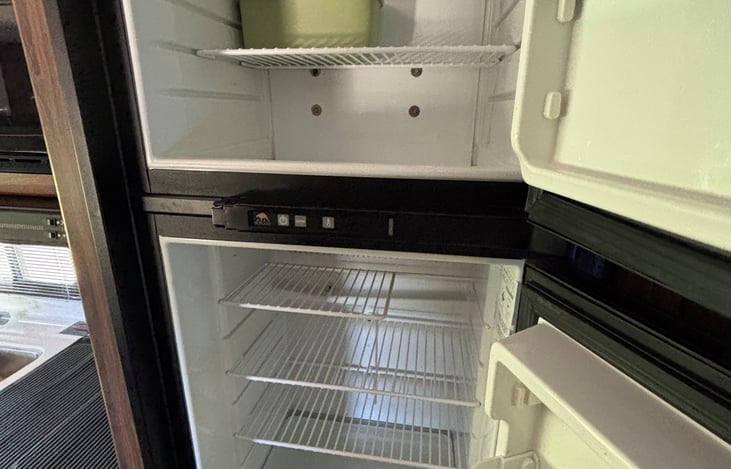 Fridge/freezer, runs on electric and/or LP gas.