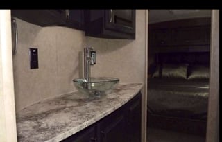 Luxurious Toy-hauler with 3 slides and 14' garage.