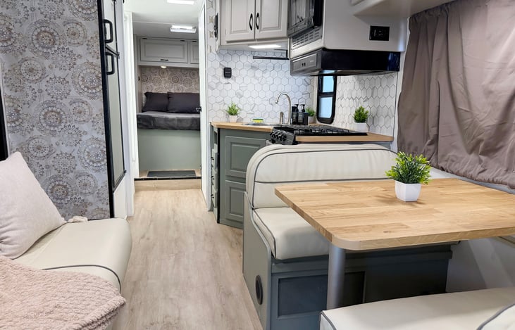 Cozy RV living area with comfortable sofa – perfect for Las Vegas camping, festivals & road trips