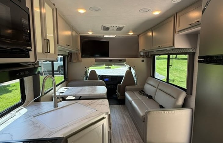 Relax with plenty of space; no need to convert the dinette every time due to having the couch. Plenty of storage space available above the couch and dinette in addition to inside the seating areas.