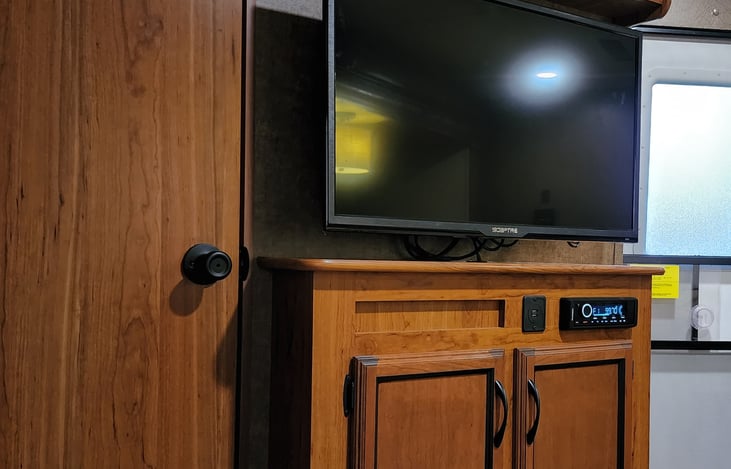 Flat screen tv with dvd and media.