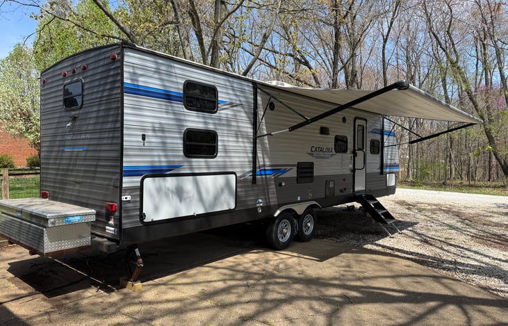 35' including the additional storage area. The outside also has lighting, outdoor speaker, dog leash, and outdoor kitchen!