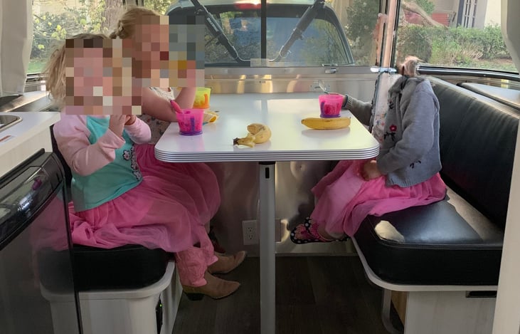 Dining area sits 4-5 comfortably. Folds down to create bed for 2 (or 3 smaller children).