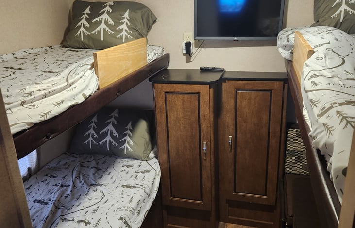 Top bunks have a safety railing if needed.