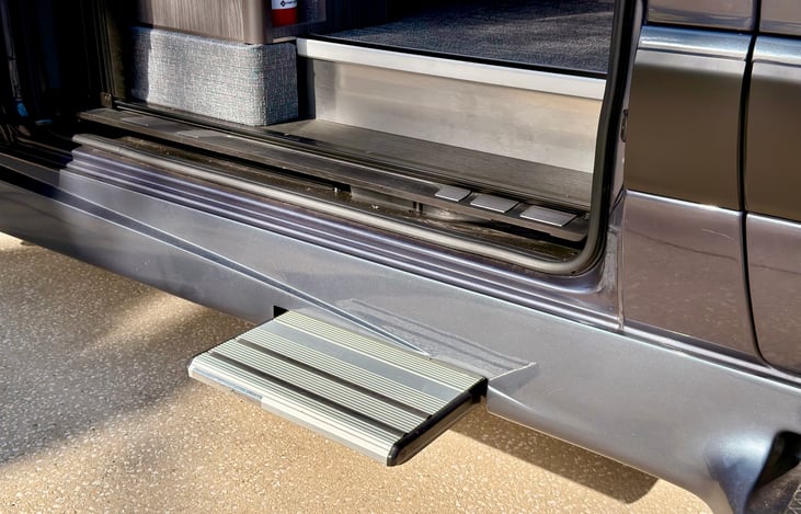 Motorized step comes out each time the sliding door is opened for easy entry into the RV. When the door shuts, the step automatically retracts.