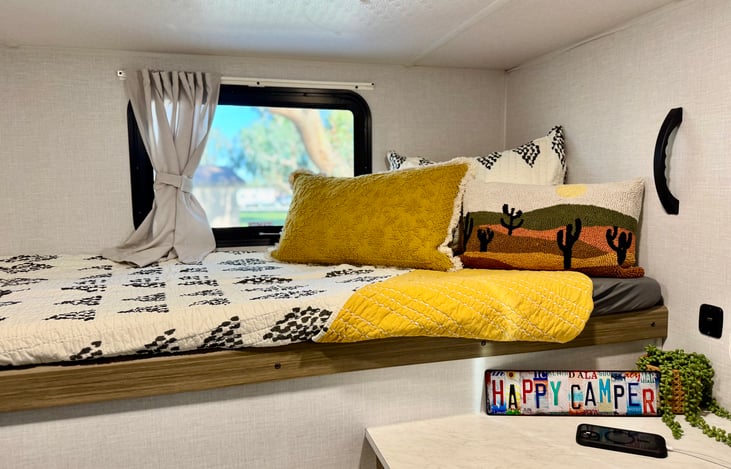Two bunk twins in the private bunk house at the back of the RV.