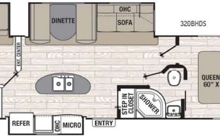 Large RV with outdoor kitchen, fireplace, and TVs