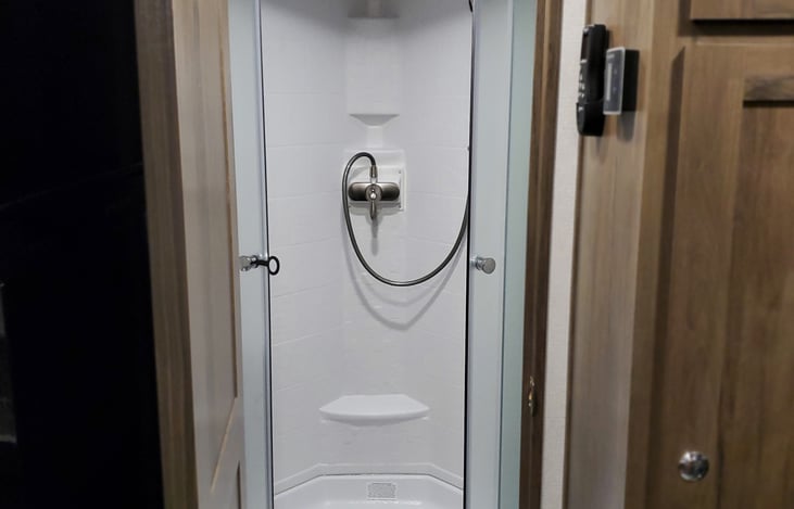 full shower. There is an external shower as well