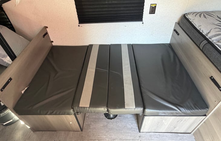 Two children may sleep comfortably on the dinette bed