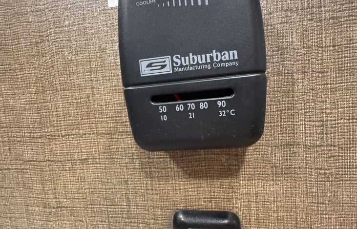 Thermostat located near main bed.