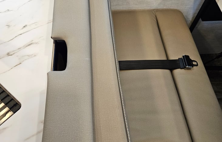 Latch system for car seat.  There are also 6 other seat belts.