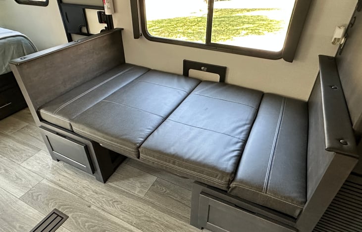 Dinette converts to bed - sleeps one adult or two small children.