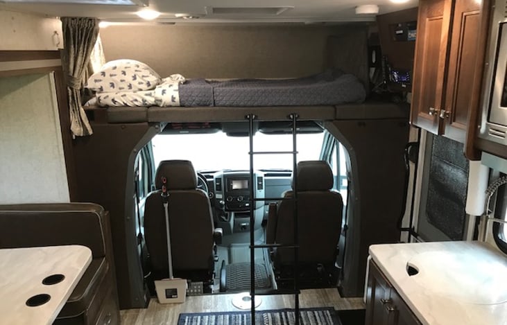 Full size overhead bunk with removable ladder.