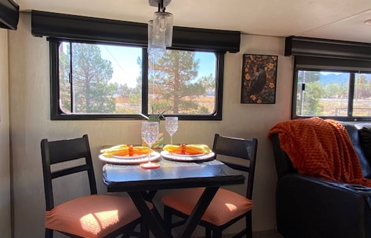 Dining table seats 4.  Two shown.