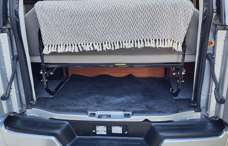 Above floor storage below sofa