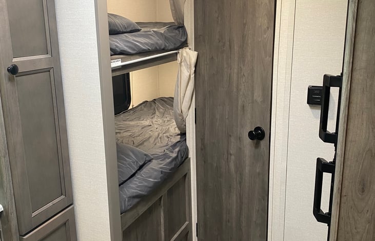 Two bunk beds that are large enough to fit adults (I am 6'1" and fit great!)